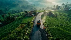 Pemadatan aspal jalan desa di Wanayasa Purwakarta menggunakan tandem roller oleh kontraktor PT. Aspalindo Karya Nusantara